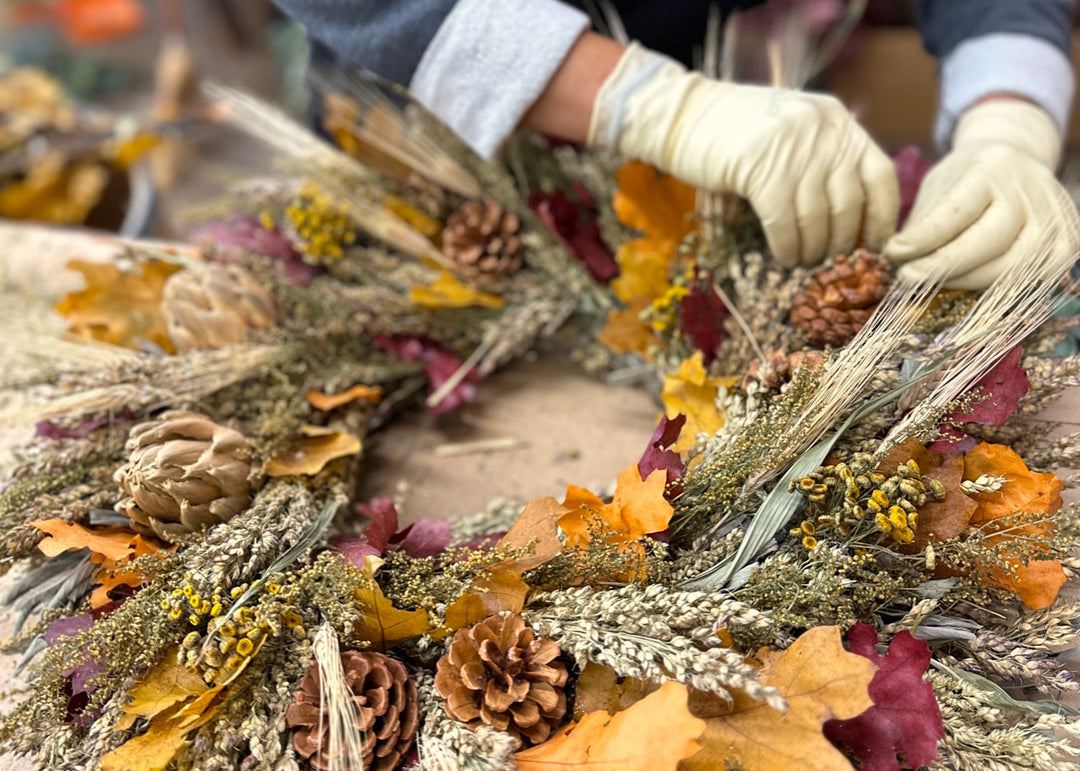 worker making wreath