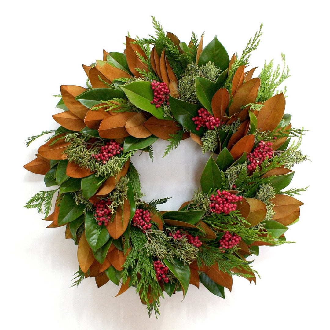 Fresh Magnolia Pepperberry Wreath - Creekside Farms Fragrant cedar, juniper and magnolia adorned with red pepperberries wreath 22"/26"