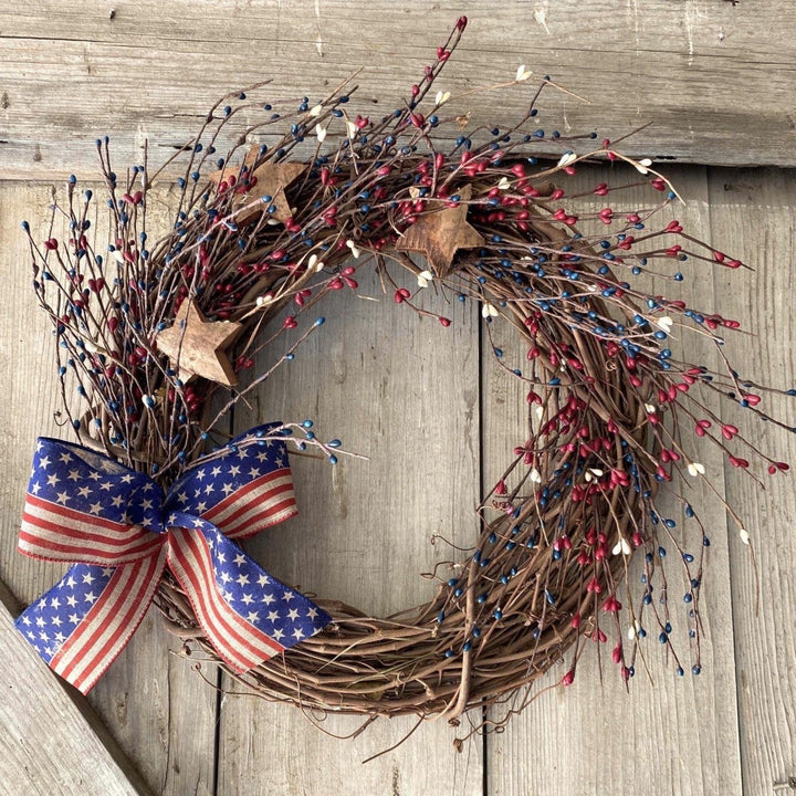 Stars and Stripes Wreath - Creekside Farms 4th of July twig wreath decorated with wooden stars and faux berries 16"