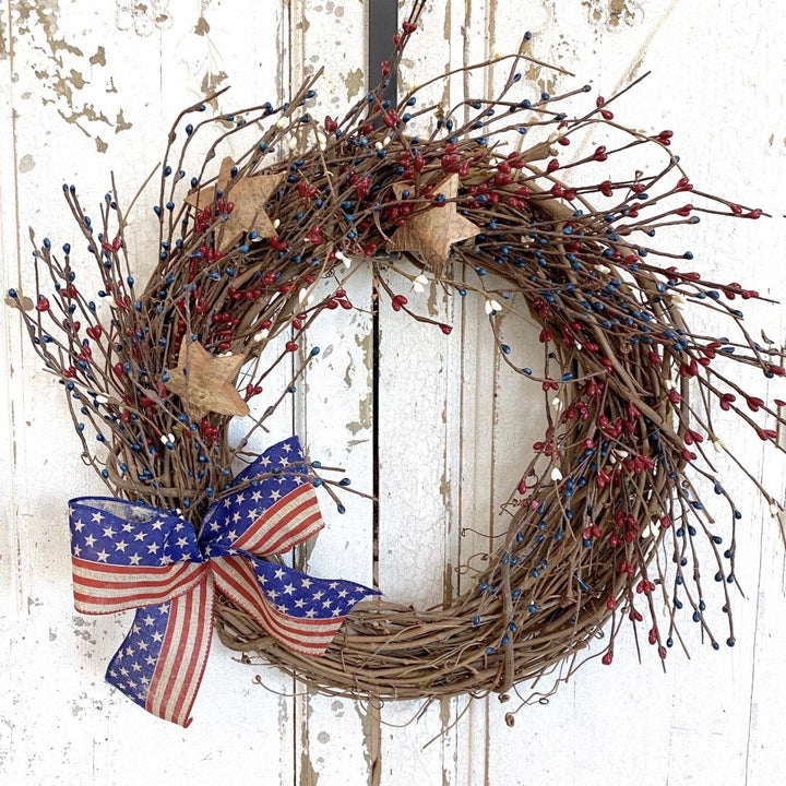 Stars and Stripes Wreath - Creekside Farms 4th of July twig wreath decorated with wooden stars and faux berries 16"