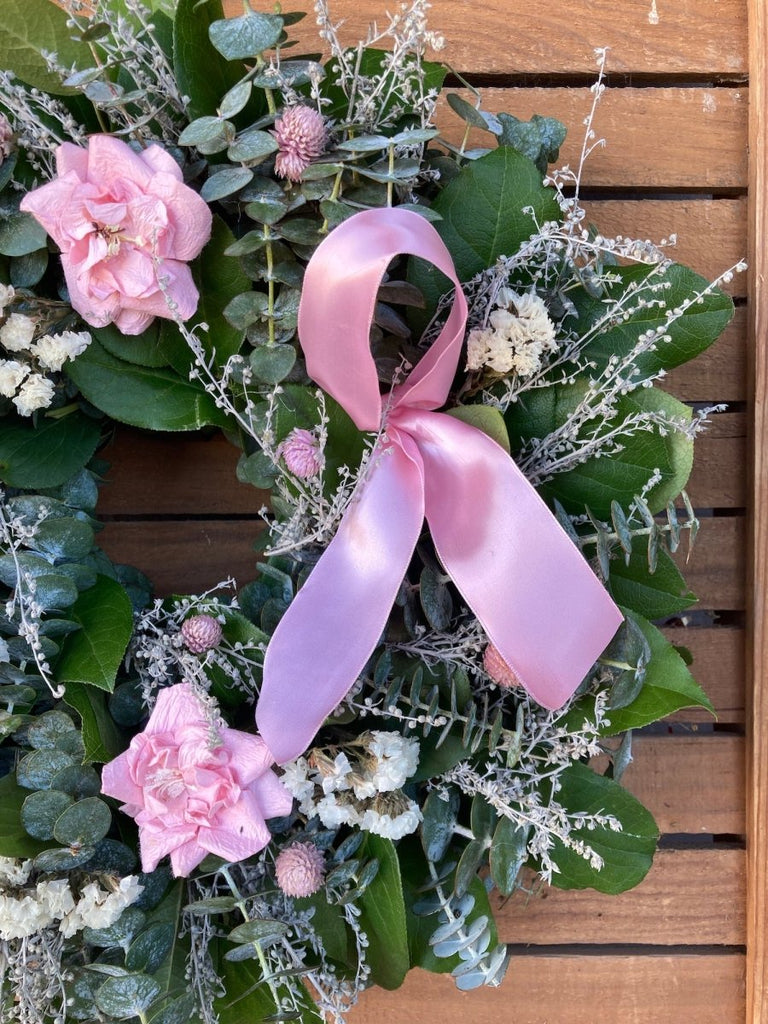 Breast Cancer Awareness Rose Wreath - Creekside Farms Made with fresh eucalyptus and salal leaves, pink paper roses and a pink wired ribbon, Awareness Wreath 16"