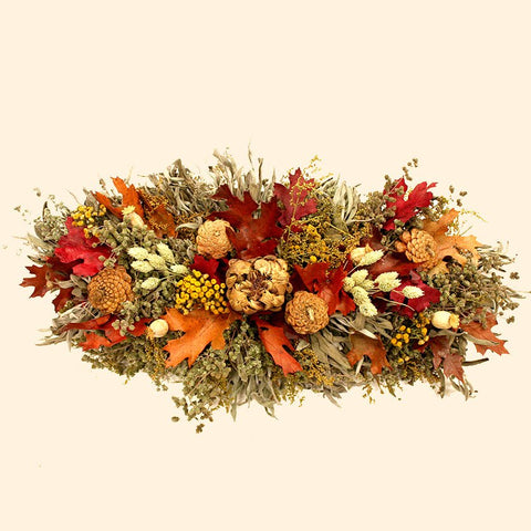 Fall Abundant Centerpiece - Creekside Farms Vibrant mix of fall leaves, herbs, grains, artichokes, pine cones and tansy centerpiece 23"X10"