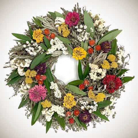 Floral Celebration Wreath - Creekside Farms Beautiful array of dried statice, yarrow, zinnias, bay and a mixture of herbs wreath 20"