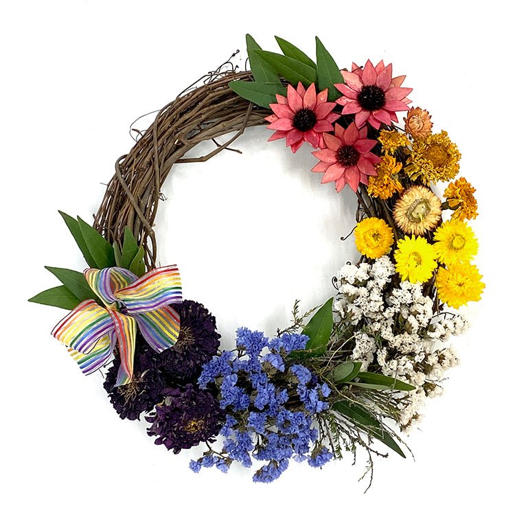 Floral Pride Wreath - Creekside Farms An abundance of dried flowers with sheer rainbow ribbon wreath 16"