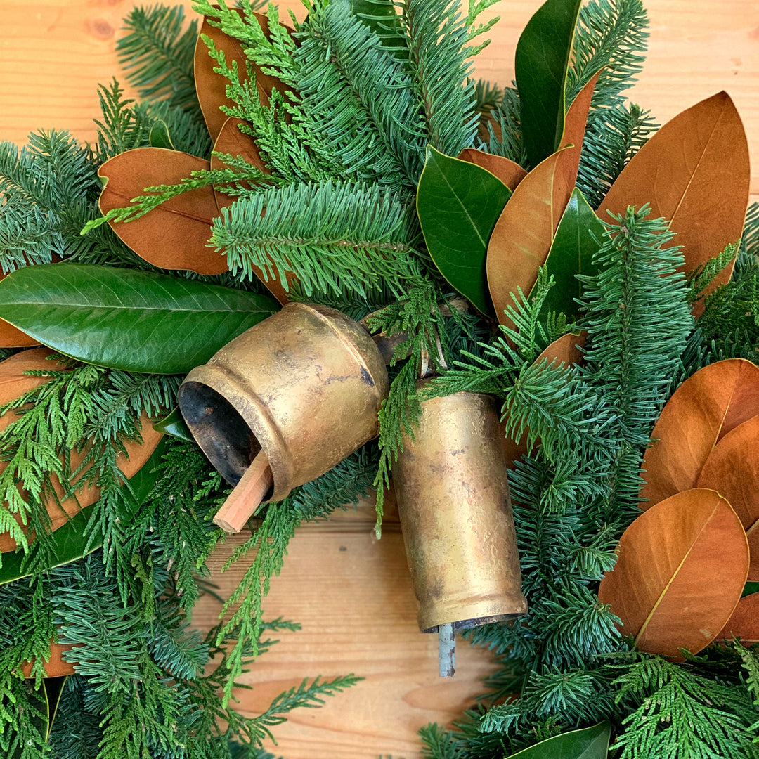Fresh & Fragrant Bell Wreath - Creekside Farms Classic mixture of fresh fir, cedar, and magnolia adorned with two metal bells wreath 22"