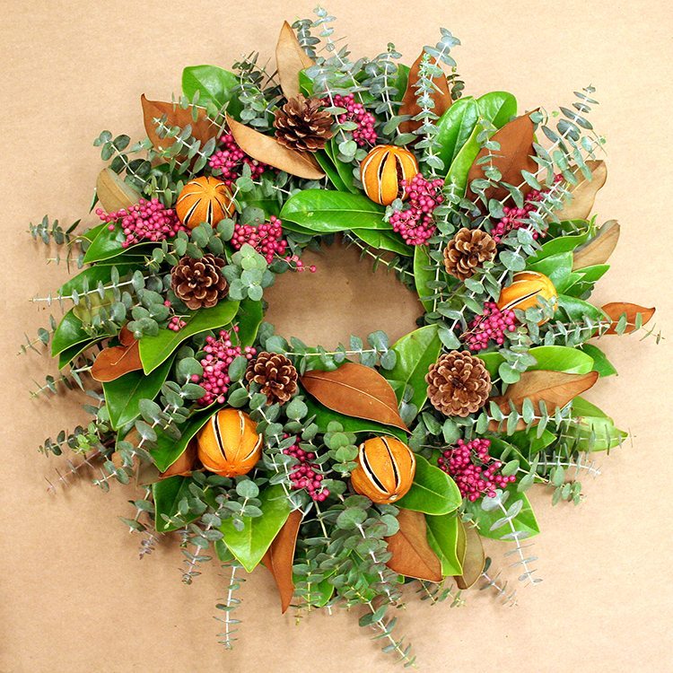 Holiday Orange and Berries Wreath - Creekside Farms Beautifully made with magnolia, eucalyptus, pepper berries, pine cones & oranges wreath 22"