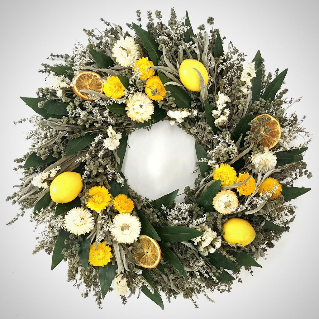 Lemon Floral Wreath - Creekside Farms Vibrant strawflowers, marjoram, savory, orange slices & statice w/ bay & faux lemons wreath 18"