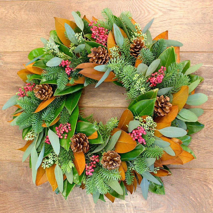 Magnolia Greens Wreath - Creekside Farms Gorgeous fresh greens & magnolia with pepper berries & rustic brown pine cones wreath 22"