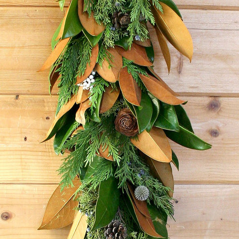 Magnolia Woodsy Garland 6' - Creekside Farms Beautiful mix of fresh magnolia & greens with tallow berries, pine cones & hints of blue garland 6'