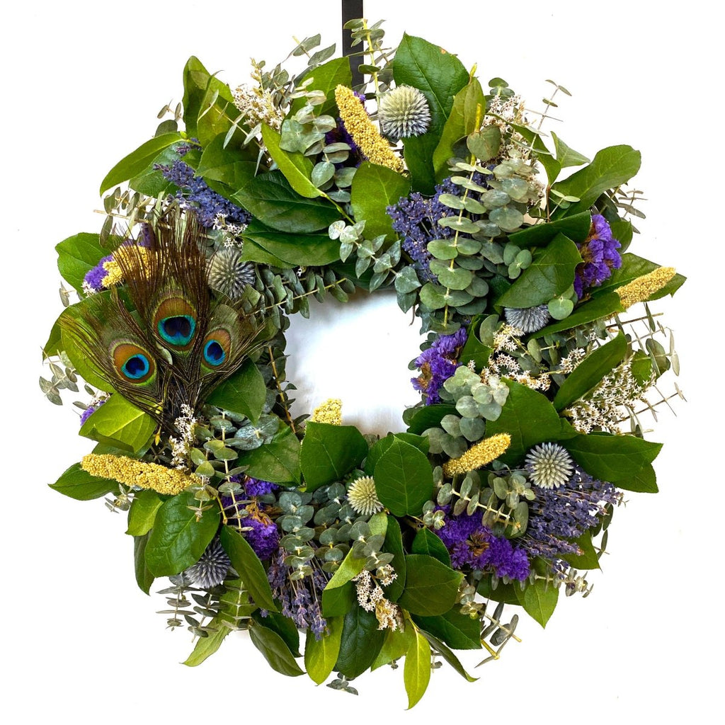 Peacock Feather Wreath - Creekside Farms Vibrant peacock feathers are the focal in this fresh eucalyptus and lemon leaves wreath 18"