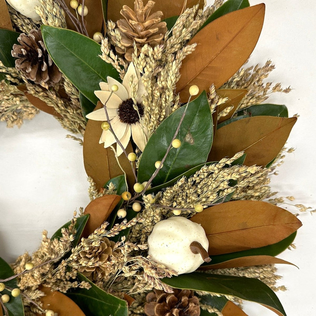 White Pumpkin Magnolia Wreath - Creekside Farms A wonderful combination of fresh magnolia and broom corn with faux white pumpkins, berries and pine cones, elegant wreath 20 & 24"